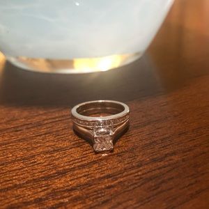 Brilliant Diamond ring (.71 ct) & band (.42 ct).